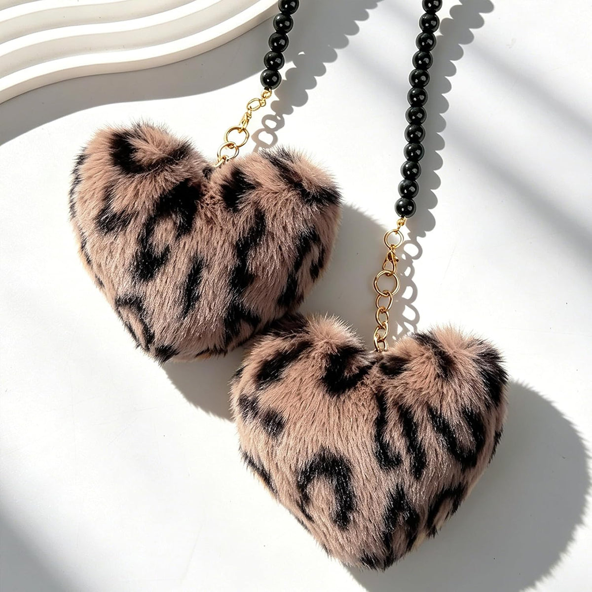 YGMONER Leopard Fuzzy Heart Car Mirror Hanging Accessories, Pair of Fluffy Cheetah Heart Shape Pendant with Glass Bead Chain - Elegant Rear View Mirror Decor Accessory (Brown Leopard)